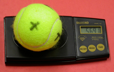 How Much Does A Tennis Ball Weigh?  