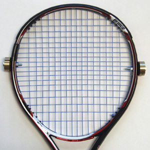 Racquet with peripheral weights